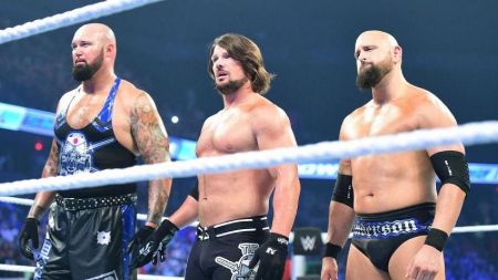 Karl Anderson alongside AJ Styles and Luke Gallows caught on the camera.